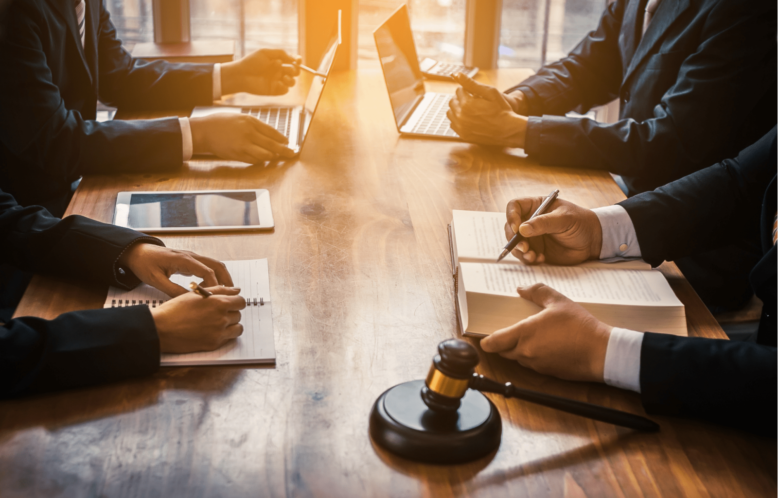 Four people in a business meeting